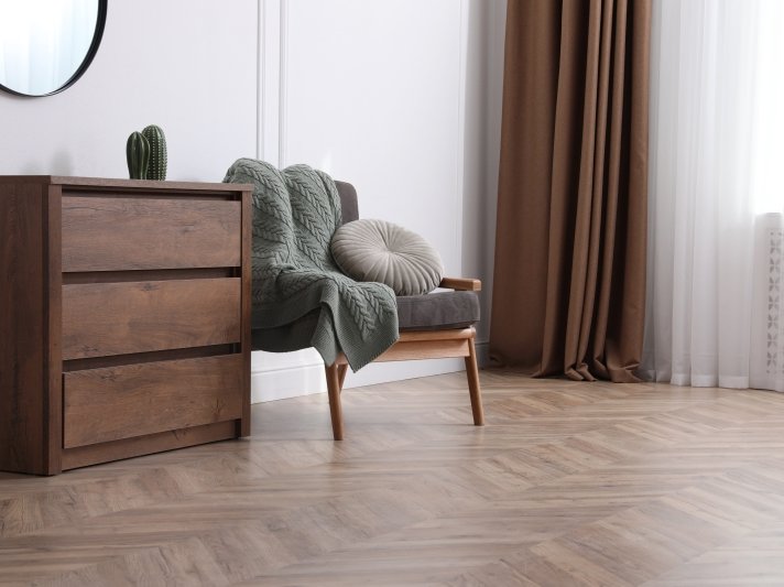 hardwood flooring installed in a beautiful herringbone pattern