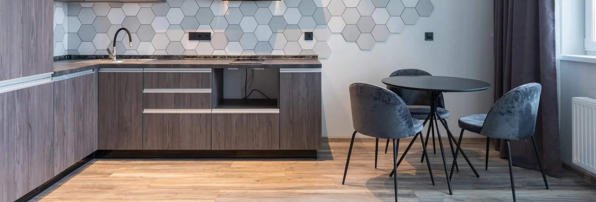 modern grey kitchen with beautiful hardwood floors